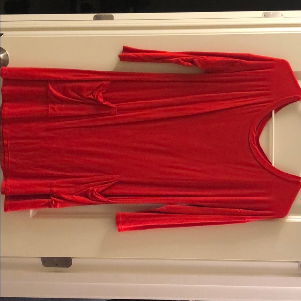 Red long tunic with buttons on back